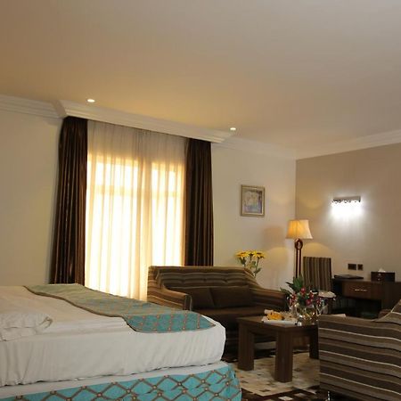 Grand Pela Hotel & Suites Абуджа Экстерьер фото