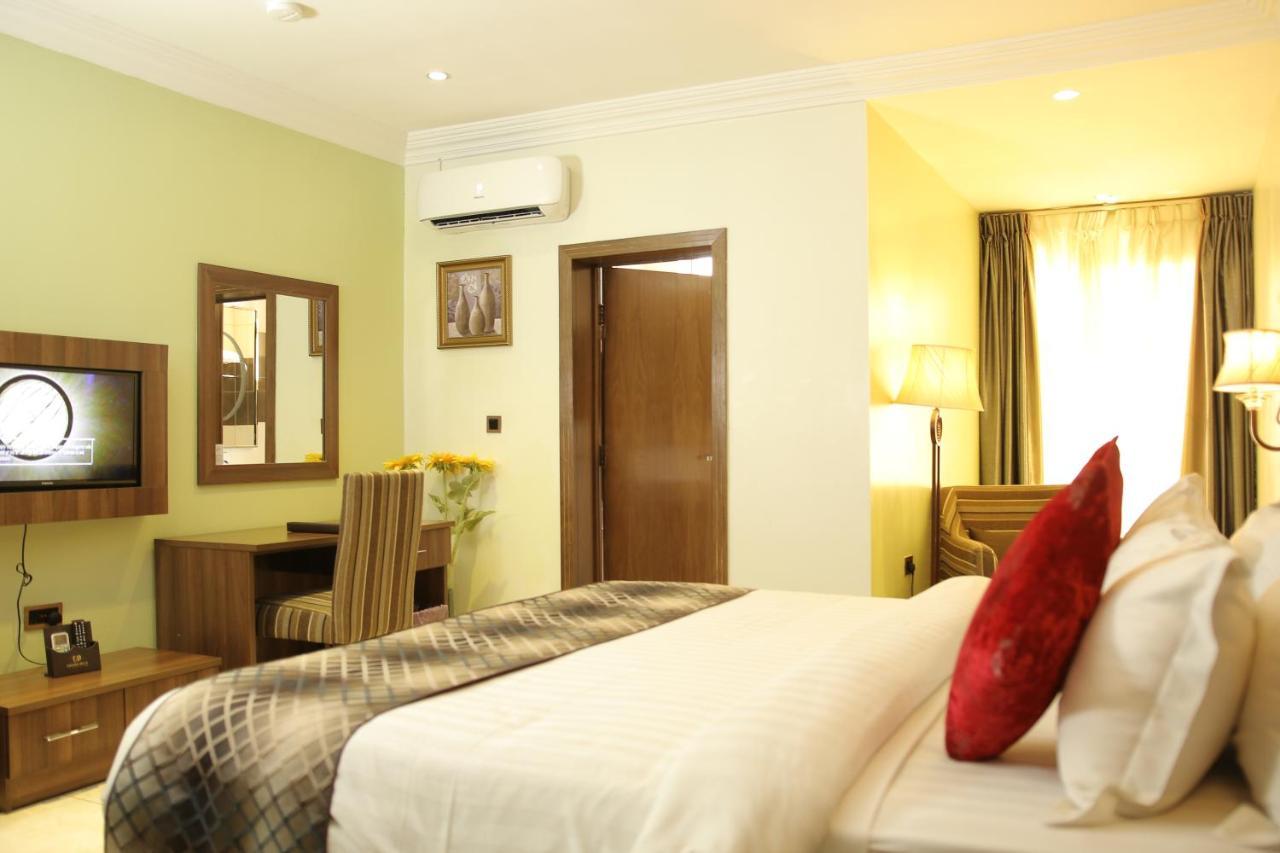Grand Pela Hotel & Suites Абуджа Экстерьер фото