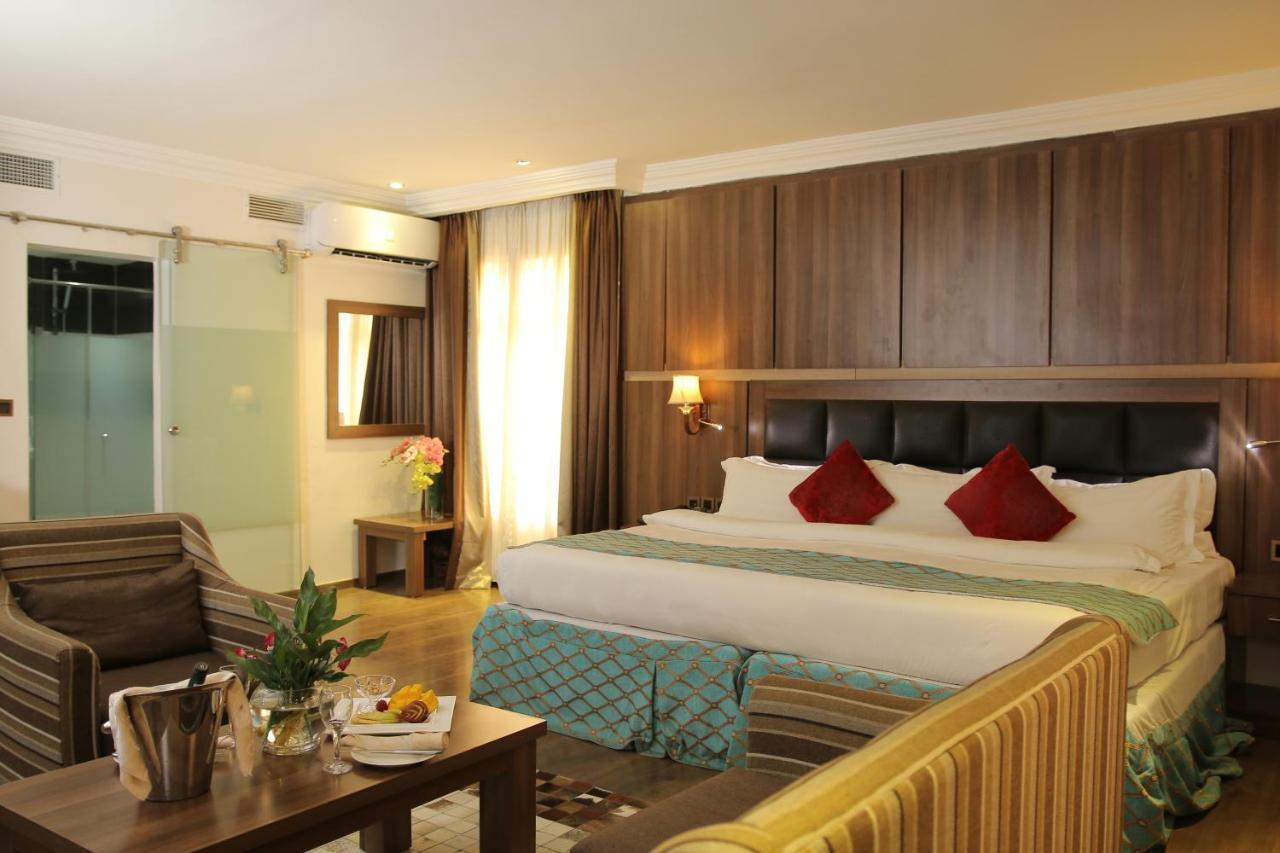 Grand Pela Hotel & Suites Абуджа Экстерьер фото