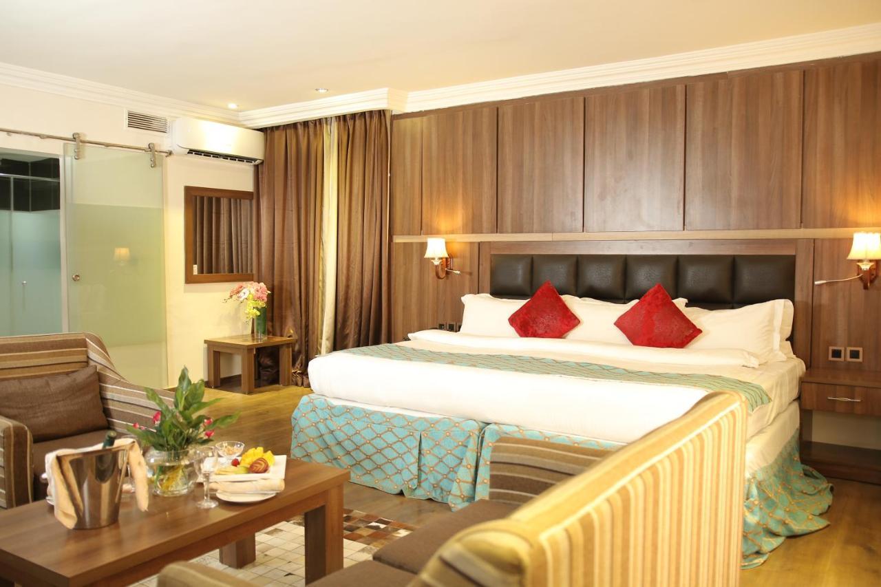 Grand Pela Hotel & Suites Абуджа Экстерьер фото