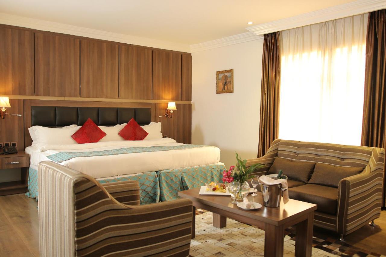 Grand Pela Hotel & Suites Абуджа Экстерьер фото