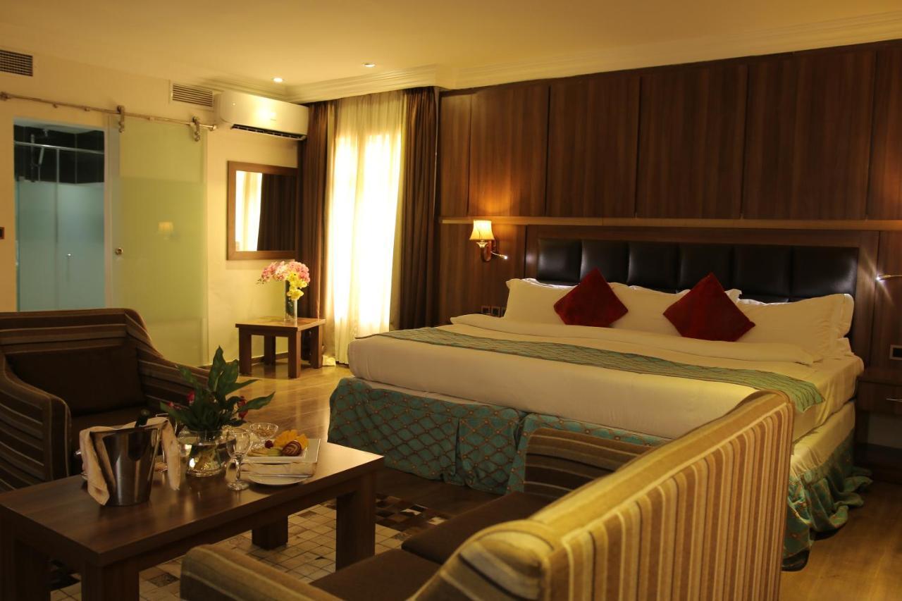 Grand Pela Hotel & Suites Абуджа Экстерьер фото