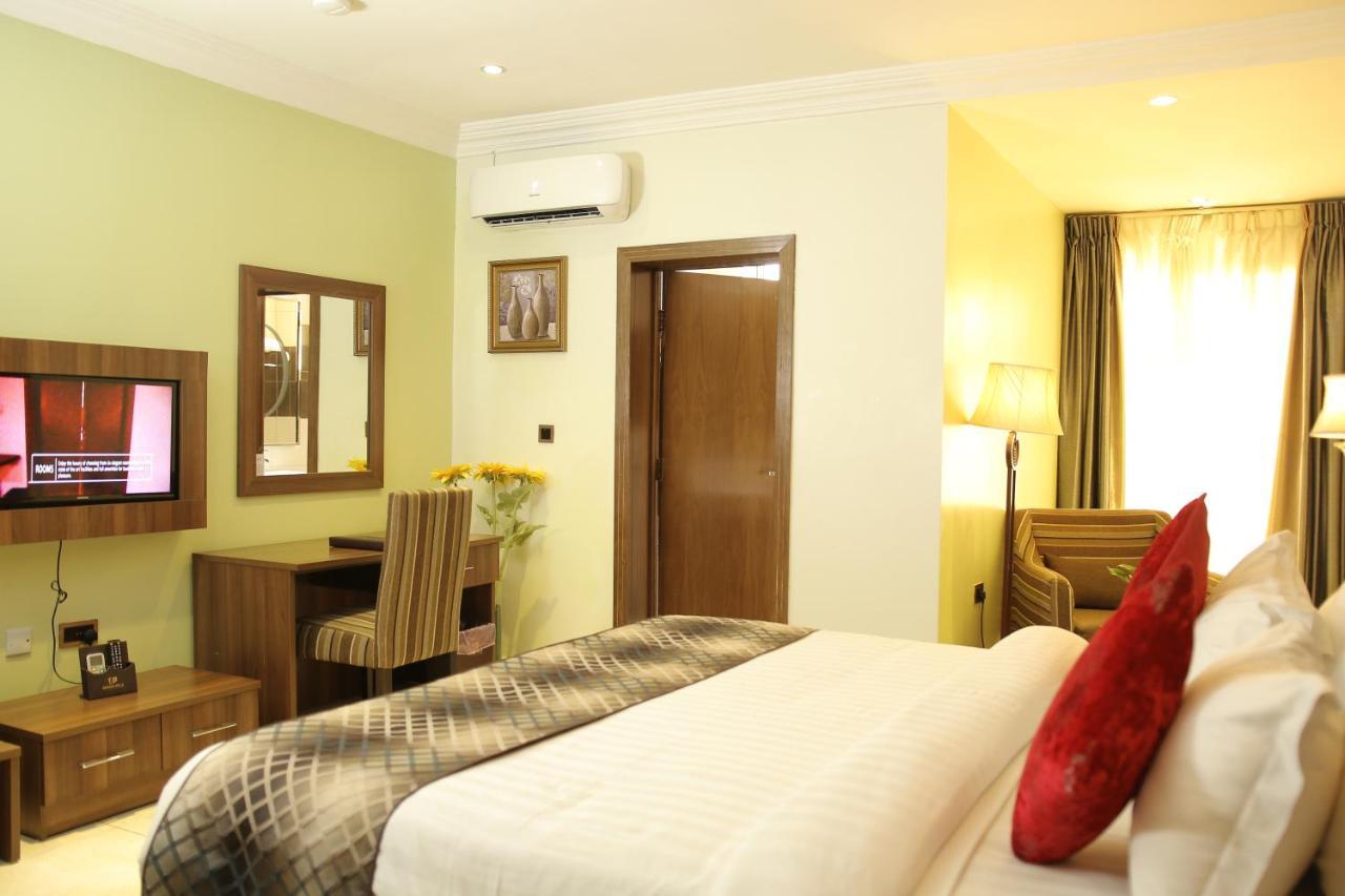 Grand Pela Hotel & Suites Абуджа Экстерьер фото